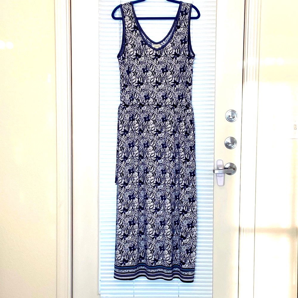 Maxi dress, sleeveless with drawstring waist ties on sides.